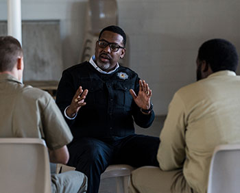 Psychologist with inmates